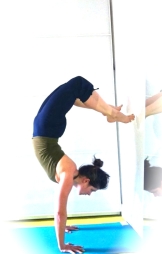 Charlie Speller in yoga scorpian pose